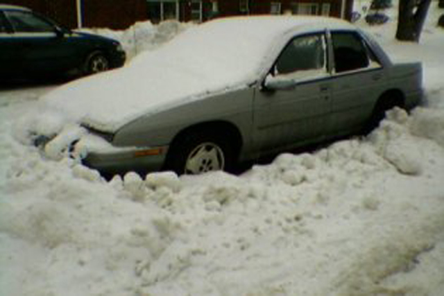 Vehicle covered in snow and temperature is colder than 32 degrees